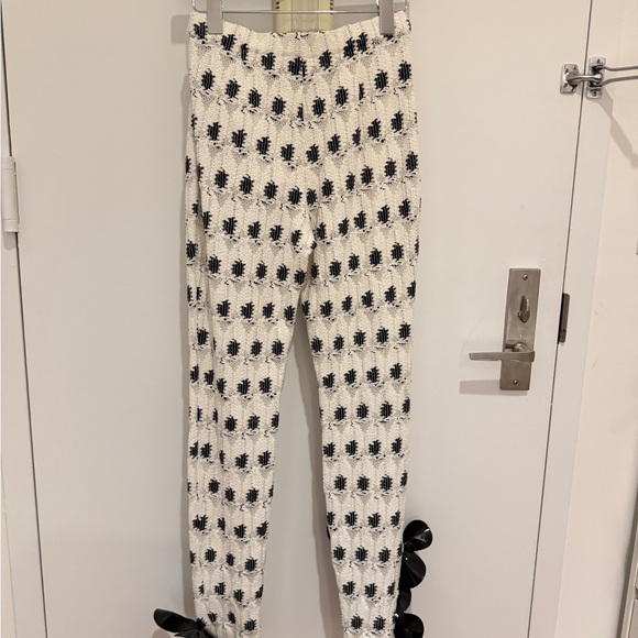 AREA eye crochet knit pants featuring crystal flower applique - Picture 6 of 12